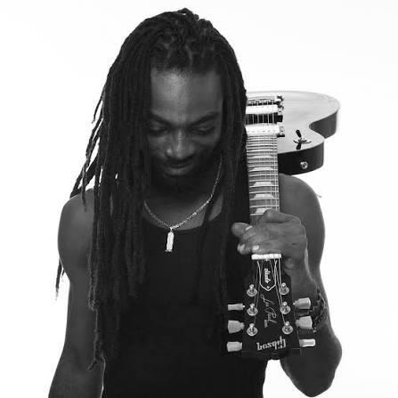 Buggy Nhakente with guitar